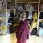 Tibetan Medicine doctor in herbs storage